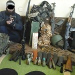 A Berlin police handout photo made available on February 5, 2016, shows a 34-year-old male suspect from Algeria, who was arrested during Thursday's raid in North Rhine-Westphalia, posing in a personal photo in a combat zone in Syria. German forces arrested two men on Thursday suspected of links to Islamic State militants preparing an attack in the German capital, police and prosecutors said, amid fears of another deadly attack on European soil. Police and special forces raided four flats and two offices in Berlin and properties in the northern regions of North Rhine-Westphalia and Lower Saxony. REUTERS/Berlin Police/Handout via ReutersATTENTION EDITORS - THIS PICTURE WAS PROVIDED BY A THIRD PARTY. REUTERS IS UNABLE TO INDEPENDENTLY VERIFY THE AUTHENTICITY, CONTENT, LOCATION OR DATE OF THIS IMAGE. IT IS DISTRIBUTED EXACTLY AS RECEIVED BY REUTERS, AS A SERVICE TO CLIENTS. EDITORIAL USE ONLY. NOT FOR SALE FOR MARKETING OR ADVERTISING CAMPAIGNS. NO RESALES. NO ARCHIVE. PICTURE MASKED AT SOURCE.